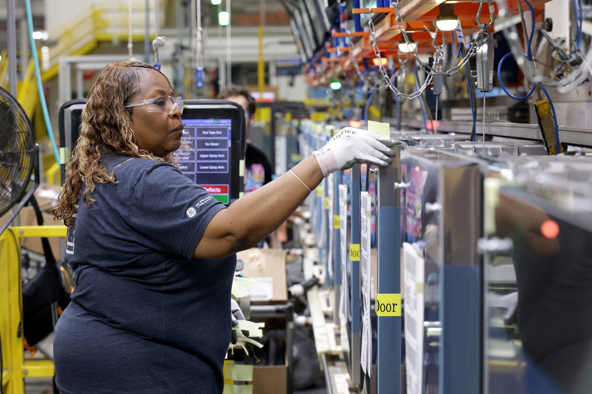 A plant employee performs a product safety test on the dishwasher production line at GE Appliances on August 08, 2025 in Louisville, Kentucky. (Photo by Michael Hickey/Getty Images for GE Appliances, a Haier company)