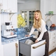 Kate Hudson with her CAFÉ Double Drawer Dishwasher for easy entertaining cleanup and CAFÉ BELLISSIMO Semi-Automatic Espresso Machine