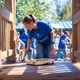 GE Appliances employees refresh a neighborhood playground improving access to safe and welcoming spaces as part of Blue Wave