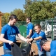 GE Appliances employees work together to strengthen community resources showcasing GE Appliances  belief in zero distance to neighbors and shared impact.