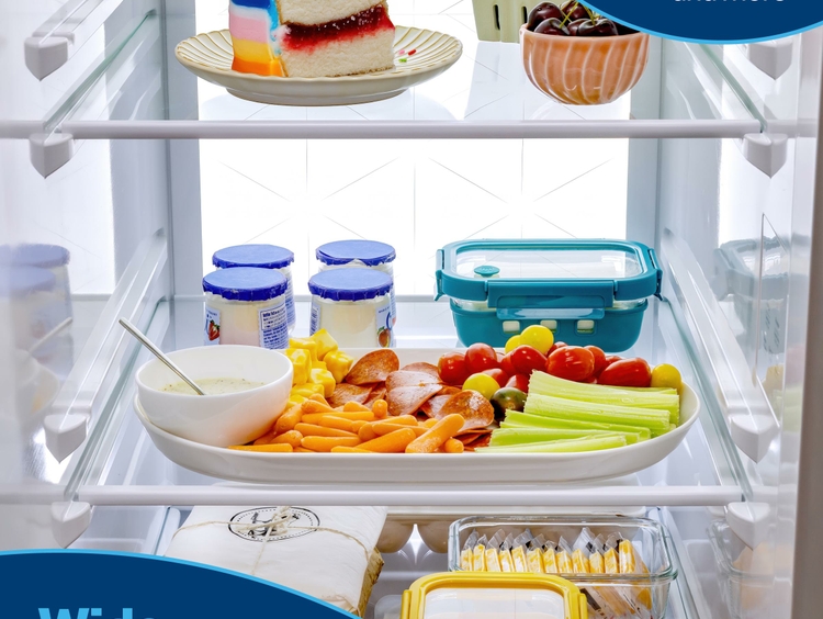 GE Appliances new side-by-side refrigerator lineup offers wide, adjustable glass shelves providing flexible storage for every need.