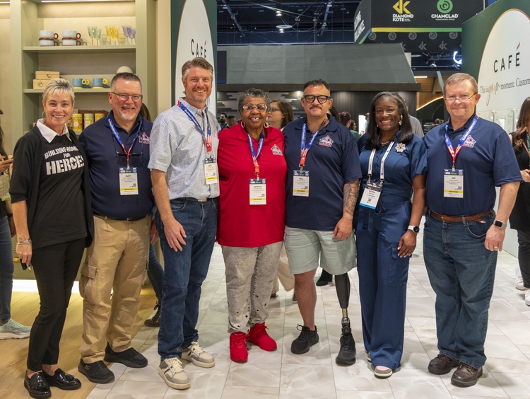 Representatives from GE Appliances and Building Homes for Heroes gather at the GE Appliances booth during the Kitchen _ Bath Industry Show KBIS Representatives from GE Appliances and Building Homes for Heroes gather at the GE Appliances booth during the Kitchen _ Bath Industry Show KBIS