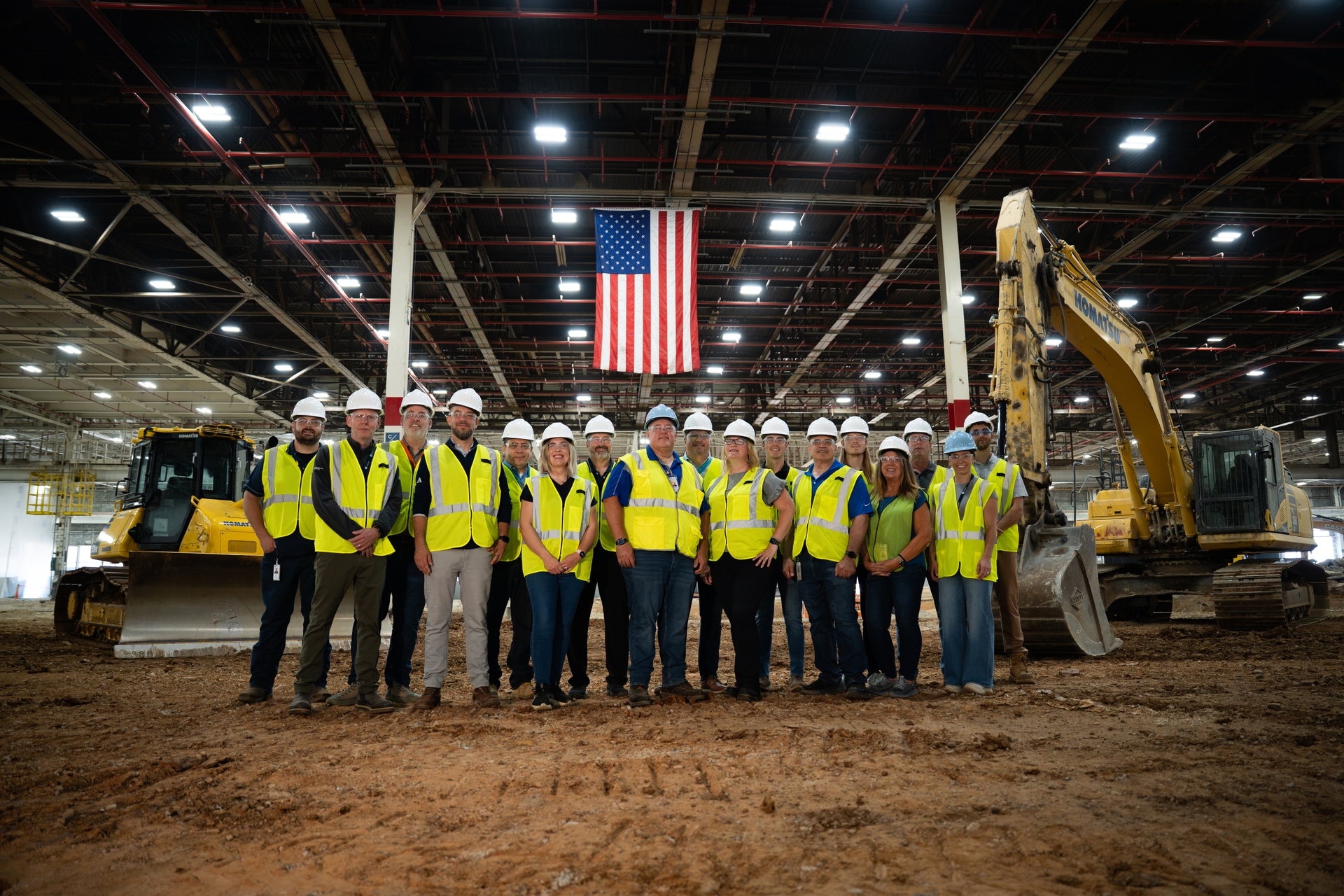 GE Appliances team members stand inside the companys new laundry manufacturing plant under construction at Appliance Park in Louisville Kentucky.