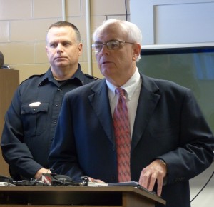 UNM Police Lt. Bob Haarhues (l.) and Associate Vice President for Student Life Walter Miller discuss increased campus security. with the news media