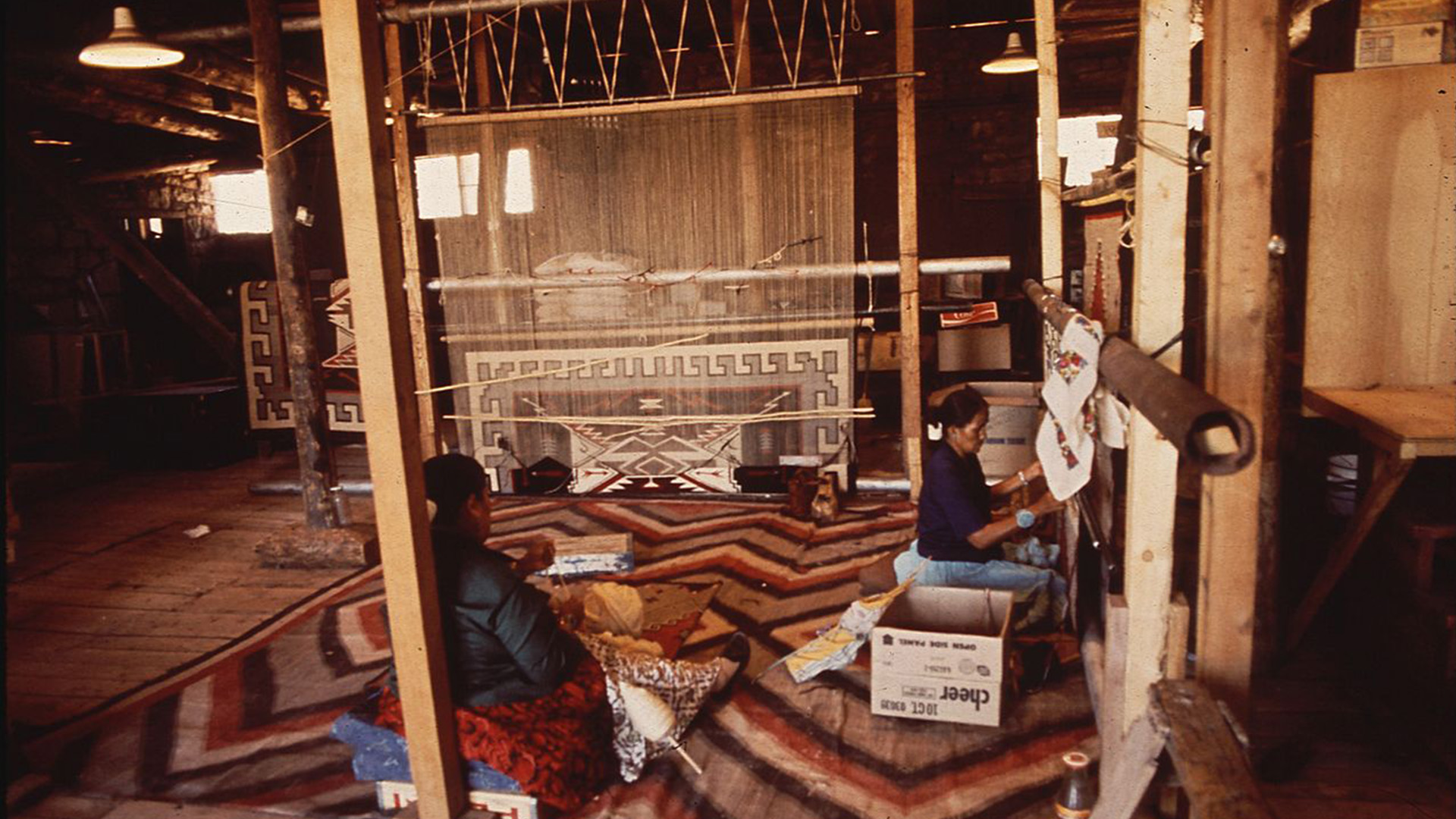Navajo women weaving