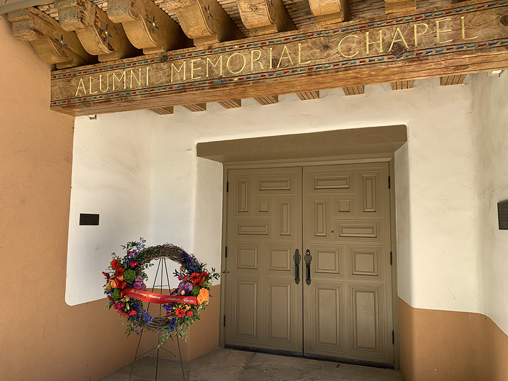 A wreath outside the UNM Alumni Memorial Chapel in memory of Melissa Vargas. Alumni Chapel wreath