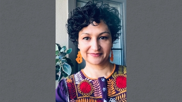 Visiting Scholar seeks answers in UNM archives