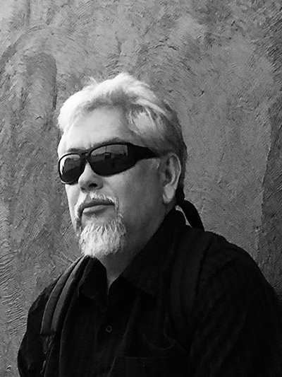 Associate Professor Levi Romero levi-romero-head-shot