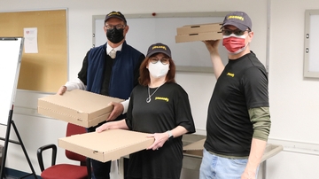 University leadership makes good on pizza party promise