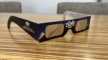Pick up a free pair of UNM Physics and Astronomy-branded eclipse glasses