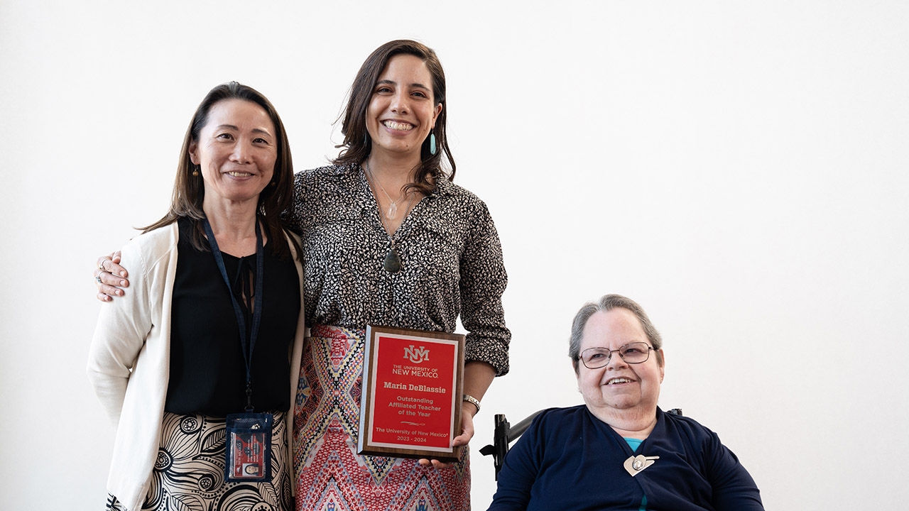 Affiliated Teacher of the Year Maria DeBlassie, center, flanked by Kiyoko Simmon (l.) and 