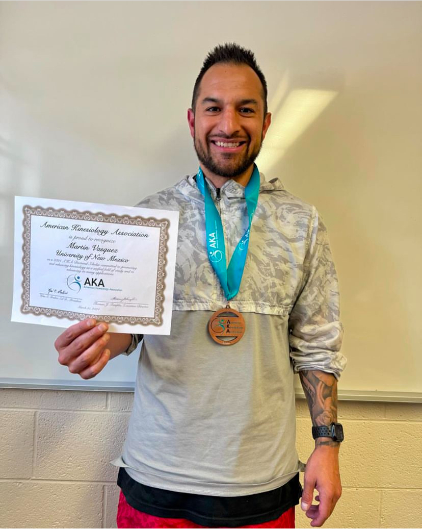 vasquez holds certificate 