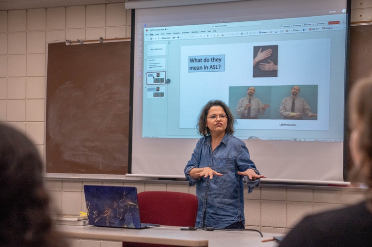 Teaching ASL.