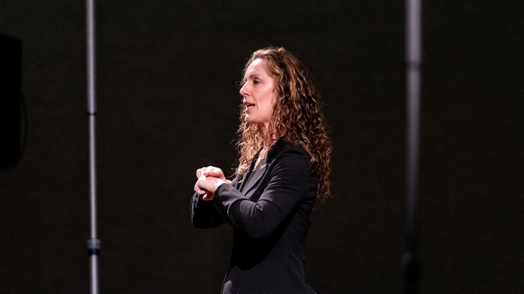A sign language interpreter presents