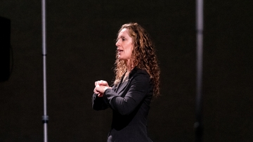 A sign language interpreter presents