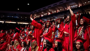 A group of students cheer