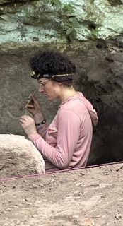 Nadia collecting samples at rock shelters