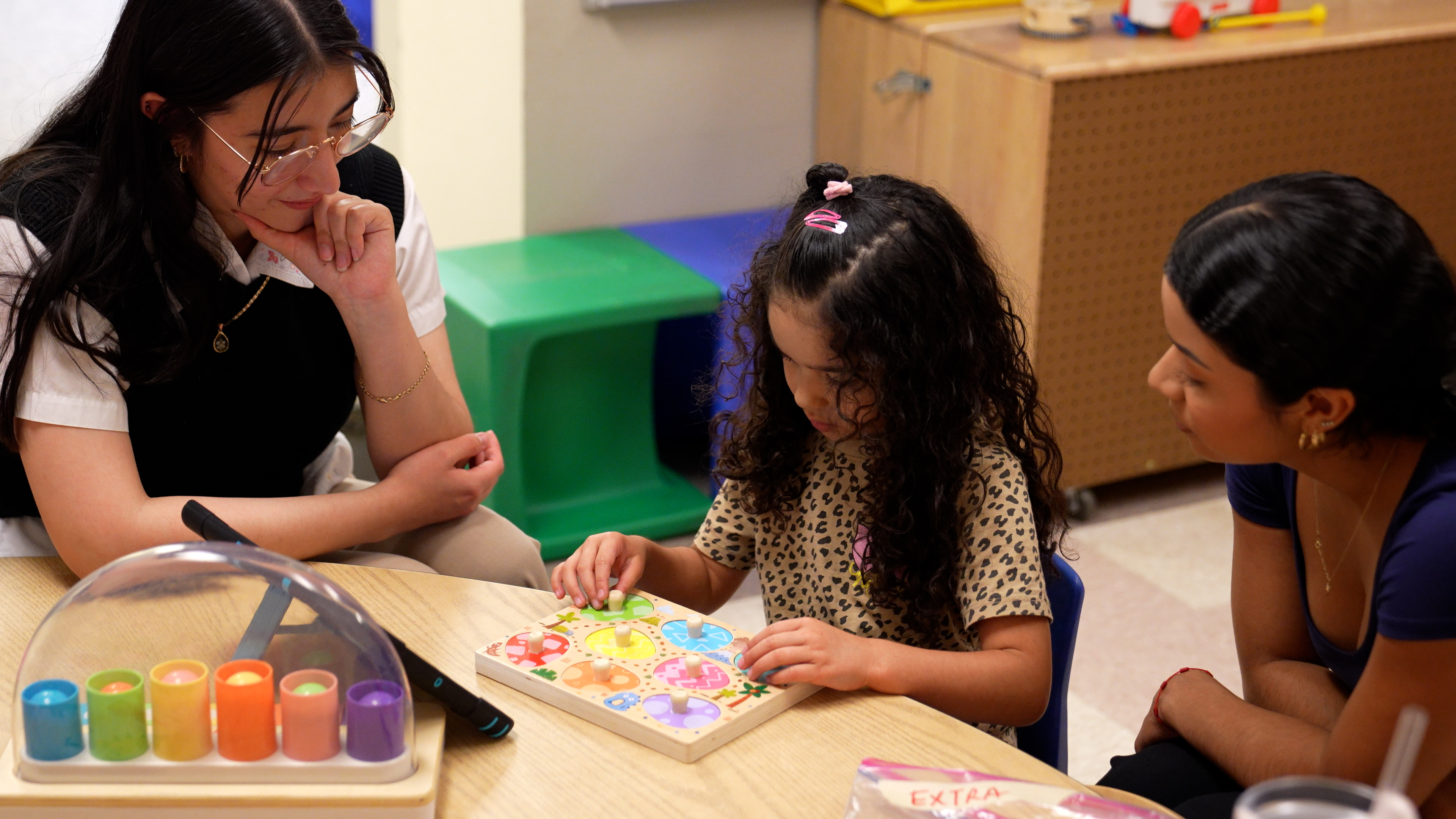 Project MESA students playing with toys during the summer camp. PLaying with toyrs