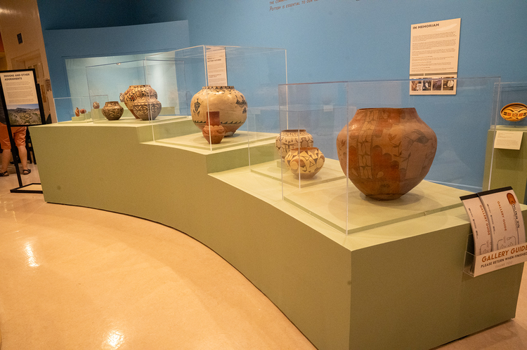 Pottery cases on display