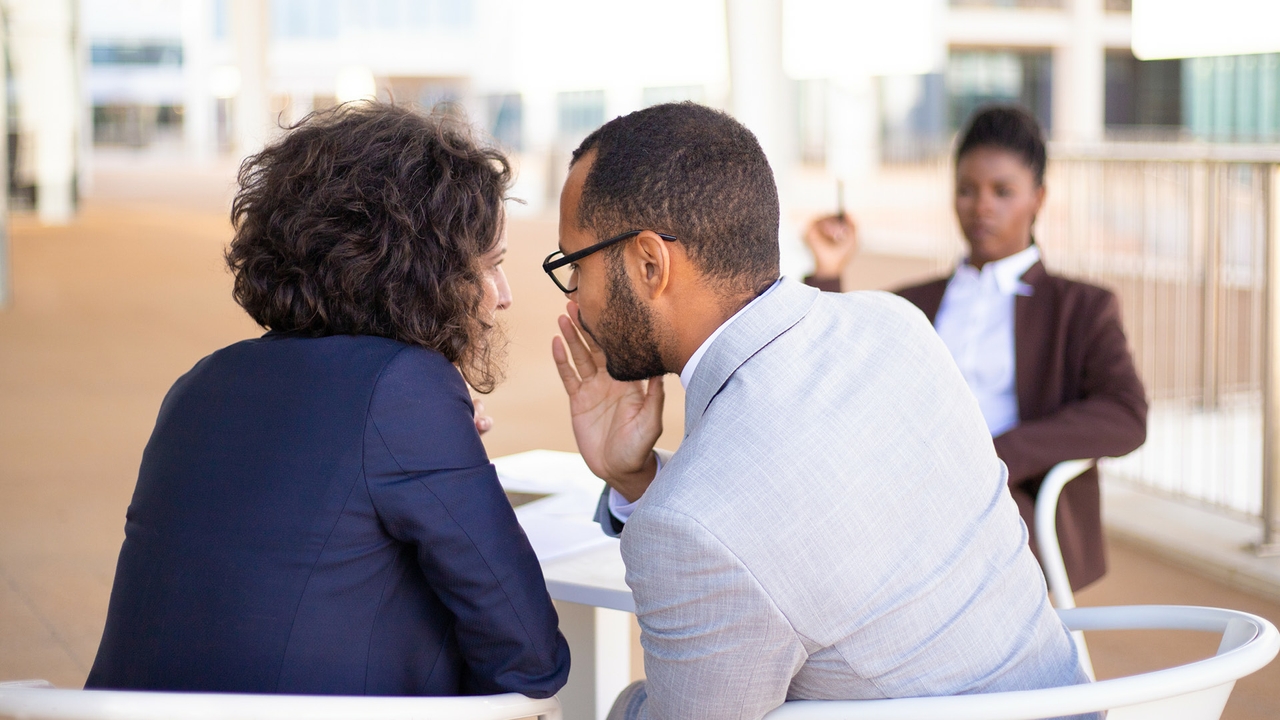 Photograph accompanying Men who gossip about teammates draw lower competence ratings than women who do the same