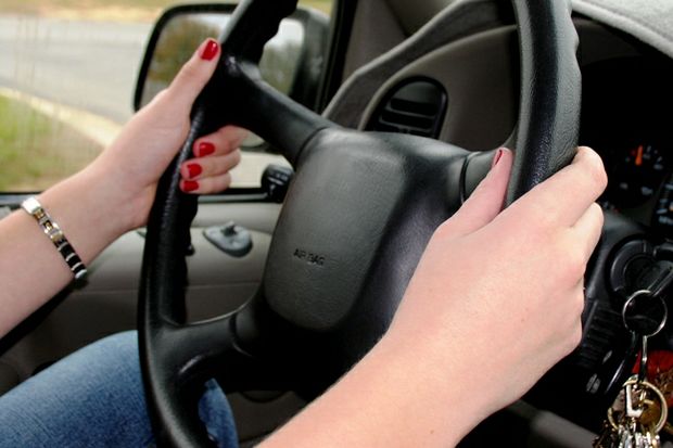 hold steering wheel at 9 and 3