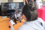 teen at distracted driving simulator