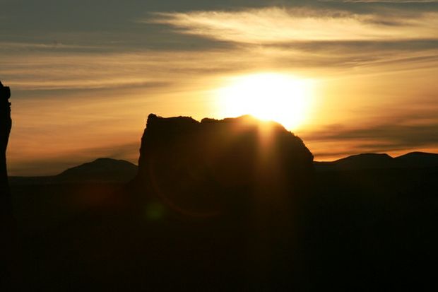 Sunset over desert mountains