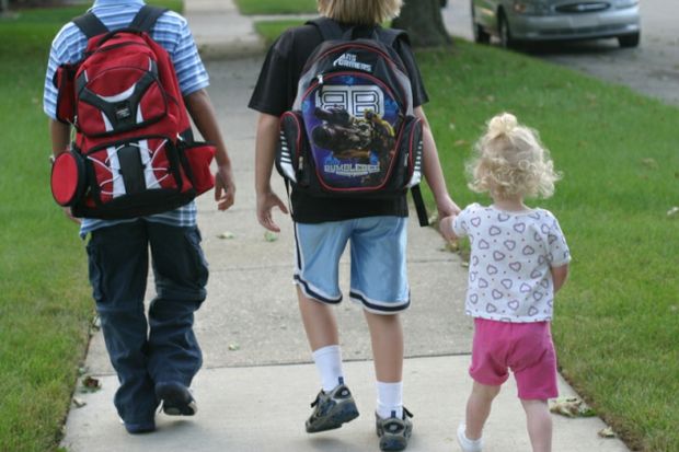 Kids walking to school by Elizabeth Edwards