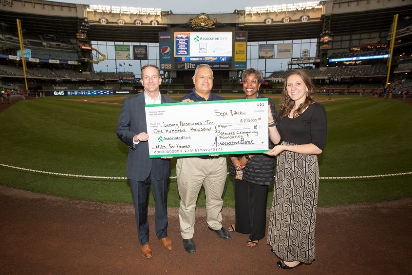Pictured from left to right: Christopher Piotrowski and Eduardo Herrera-Mier of Associated Bank, Cecilia Gore of Brewers Community Foundation and Mary DeLaat of Milwaukee Brewers.