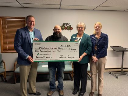Associated Bank donates $10,000 to Midwest Indian Mission and New Hope Shelter