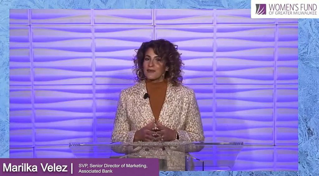 Marilka Velez presents at the Women's Fund of Greater Milwaukee Game Changers Driving Equity Forward event 