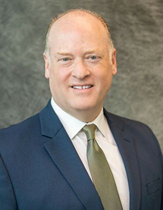 Volunteers of Associated: John R. Johnson, Residential Loan Officer–Small Markets, Rockford, Illinois