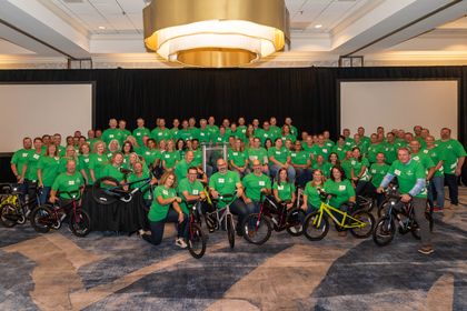 Children at Boys & Girls Clubs of Greater Milwaukee receive 15 new bikes from Associated Bank leadership team volunteer activity