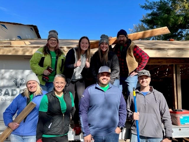 Tami Chafer and team volunteering with Habitat for Humanity