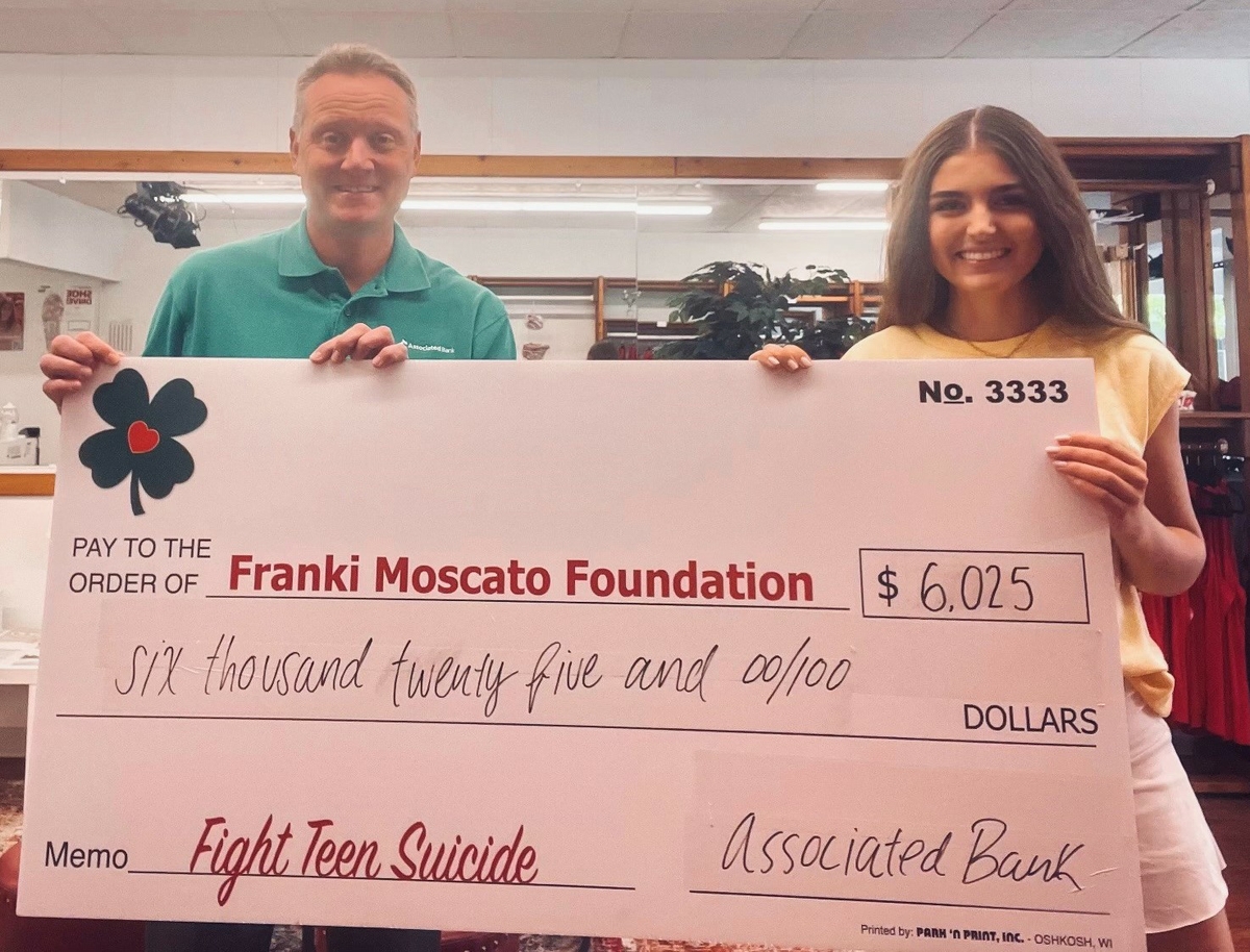 Associated Bank colleagues raise nearly $9,000 “fore” a cause