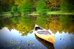 empty canoe waiting on lake