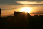 Sunset over desert mountains