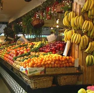 Farmers' market produce stand showing assorted fruits and vegetablescopyright American Heart Association