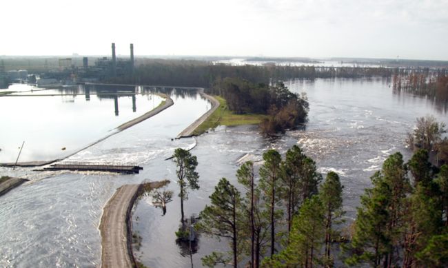 Sutton cooling lake breach flows into Cape Fear River; Sutton combined cycle plant in backdrop. Photo uploaded on Sept. 22, 2018.