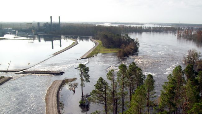Sutton cooling lake breach flows into Cape Fear River; Sutton combined cycle plant in backdrop. Photo uploaded on Sept. 22, 2018.