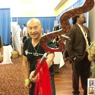 James Lew with weapon