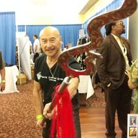 James Lew with weapon