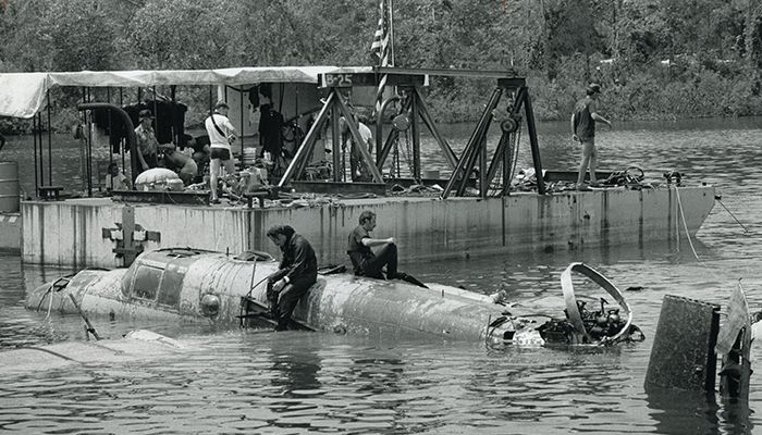 The Navy Reserve led the recovery effort in 1983. Duke Power Company provided a barge to rest the plane on after it was lifted out of the water.