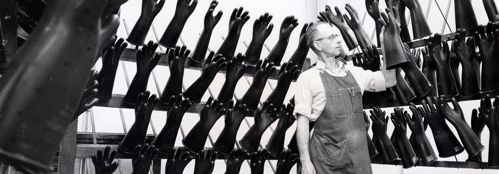 A building, a truck and The Glove Man