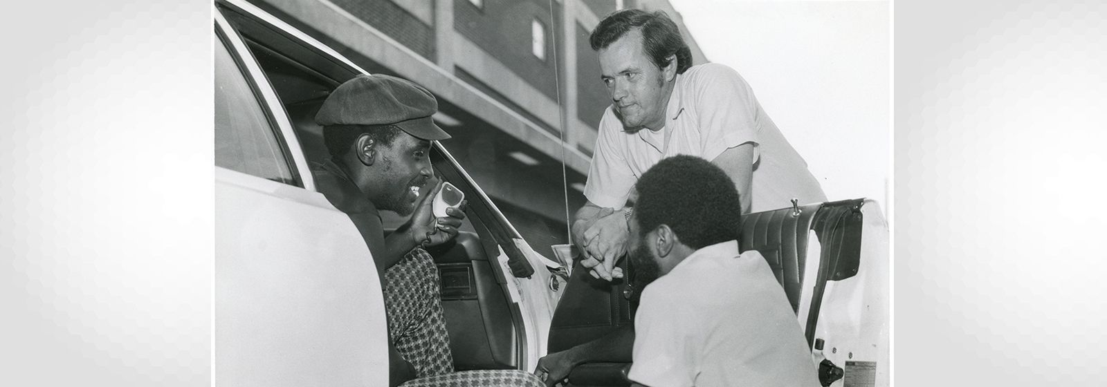 Retro photos: What are these guys talking about?
