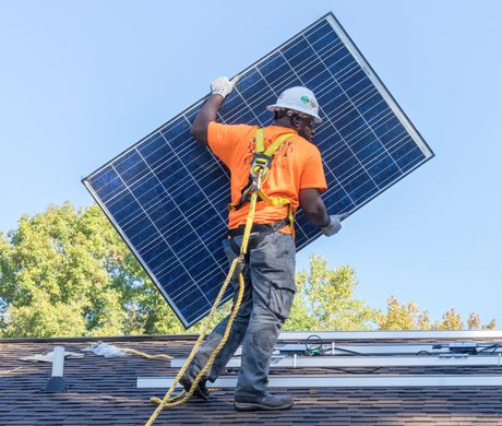 CPCC Student and solar panel