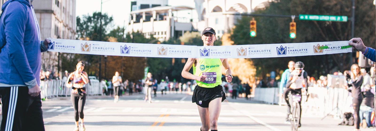 Running partners win Charlotte marathons 