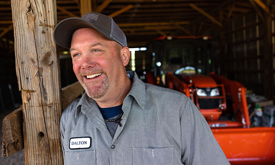 Michael Dalton, a 49-year-old white male, farms around a Duke Energy solar facility.