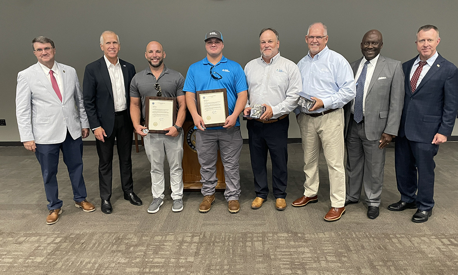 Matt Martinka and Nathan Curlee gather with federal leaders in Washington D.C. at a ceremony where they were recognized for their heroism in the aftermath of Hurricane Helene.