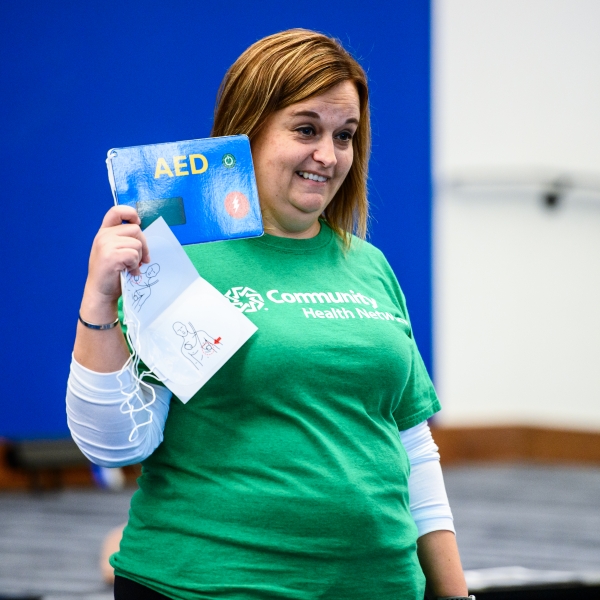 Instructor+teaches+about+AED+usage
